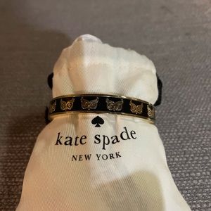 Kate Spade black enamel and gold bangle bracelet